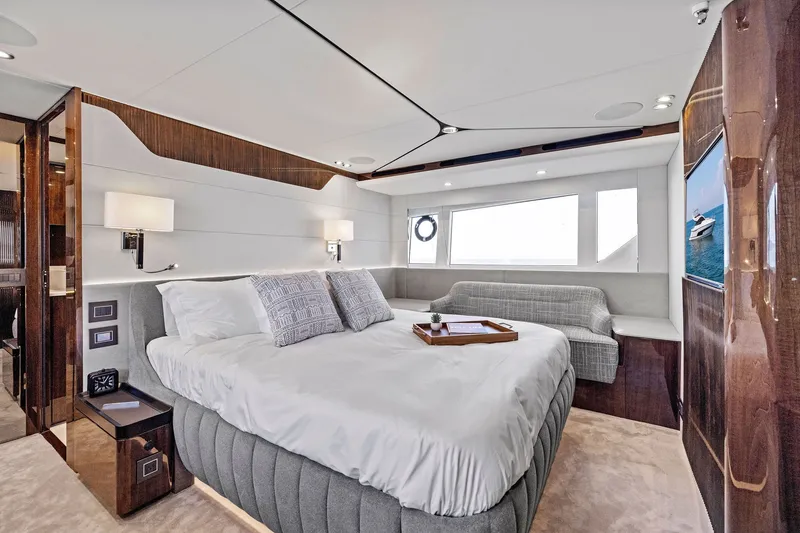 Slide: The Image of Luxurious bedroom interior of 2024 Fairline Phantom 65 yacht with modern design elements. - 35
