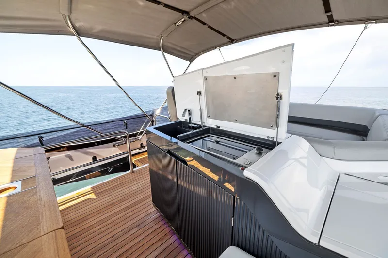Slide: The Image of Luxurious 2024 Fairline Phantom 65 yacht deck with modern amenities and ocean view. - 55