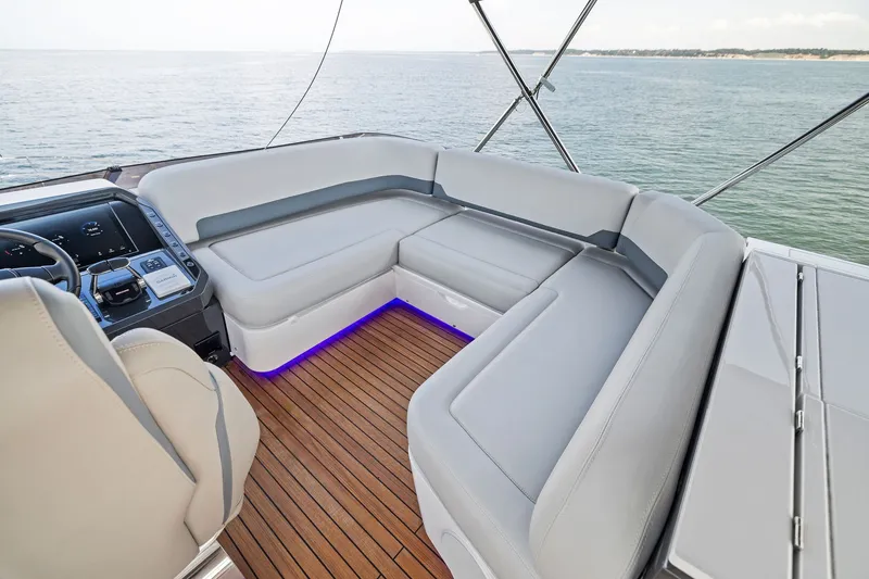 Slide: The Image of Luxurious seating area on 2024 Fairline Phantom 65 yacht with ocean view. - 52