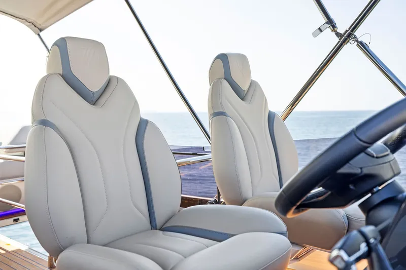 Slide: The Image of Luxurious seating on 2024 Fairline Phantom 65 yacht, featuring elegant design and ocean view. - 59