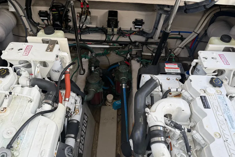 Slide: The Image of Engine room of a 2007 Sea Ray 40 Sundancer with visible components and wiring. - 31