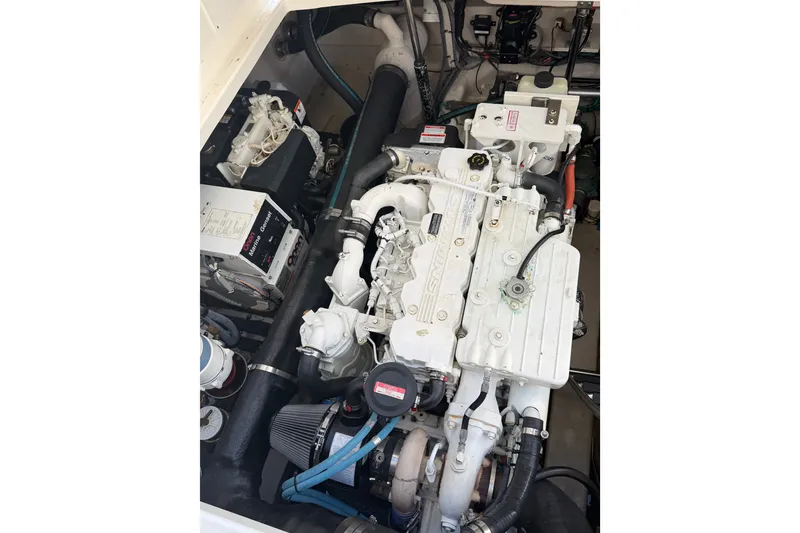 Slide: The Image of Engine compartment of a 2007 Sea Ray 40 Sundancer boat, showcasing mechanical components. - 28