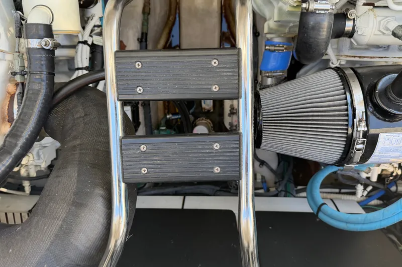 Slide: The Image of Engine compartment of a 2007 Sea Ray 40 Sundancer with visible ladder and components. - 32