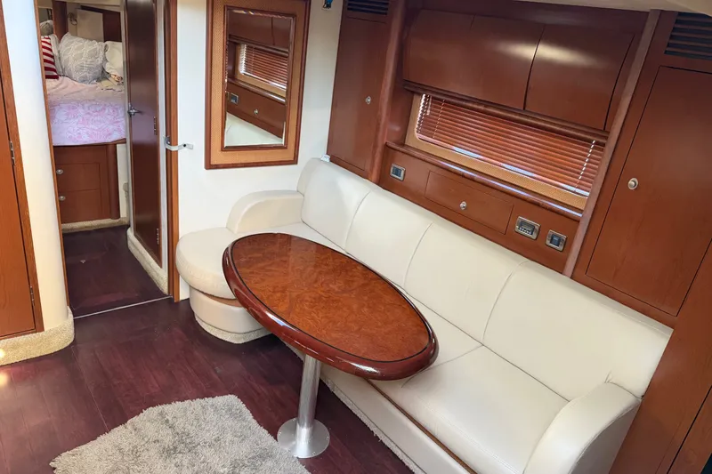 Slide: The Image of Luxurious interior of 2007 Sea Ray 40 Sundancer yacht with elegant wood finishes. - 11