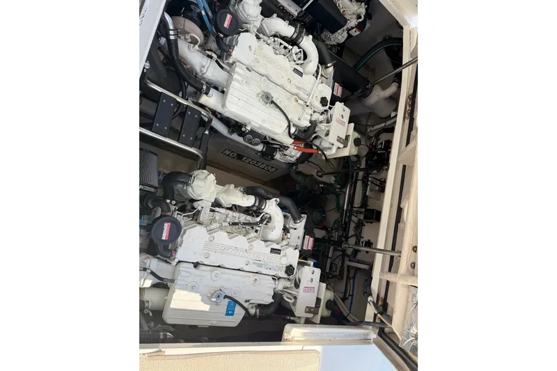 Slide: The Image of Engine room of a 2007 Sea Ray 40 Sundancer with twin diesel engines. - 27
