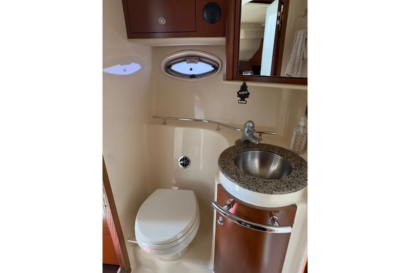Slide: The Image of Luxurious 2007 Sea Ray 40 Sundancer bathroom with modern sink and toilet. - 15