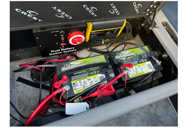 Slide: The Image of Dual battery system in 2022 Crest 240 Classic CPTD boat with Marine Master batteries. - 16