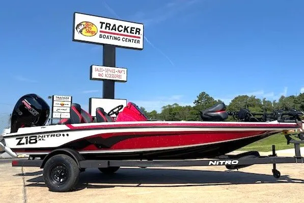 The Image of 2027 Nitro Z18 XL Pro boat at Tracker Boating Center, red and black design. - 0