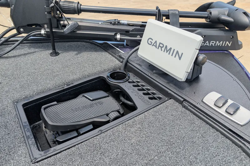 Slide: The Image of 2027 Nitro Z18 XL Pro boat with Garmin navigation system and foot pedal controls. - 6