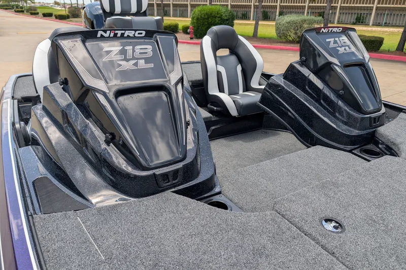 Slide: The Image of 2027 Nitro Z18 XL Pro boat interior with dual consoles and seating. - 5