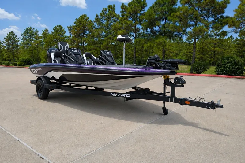 Slide: The Image of 2027 Nitro Z18 XL Pro boat on trailer in outdoor setting. - 2