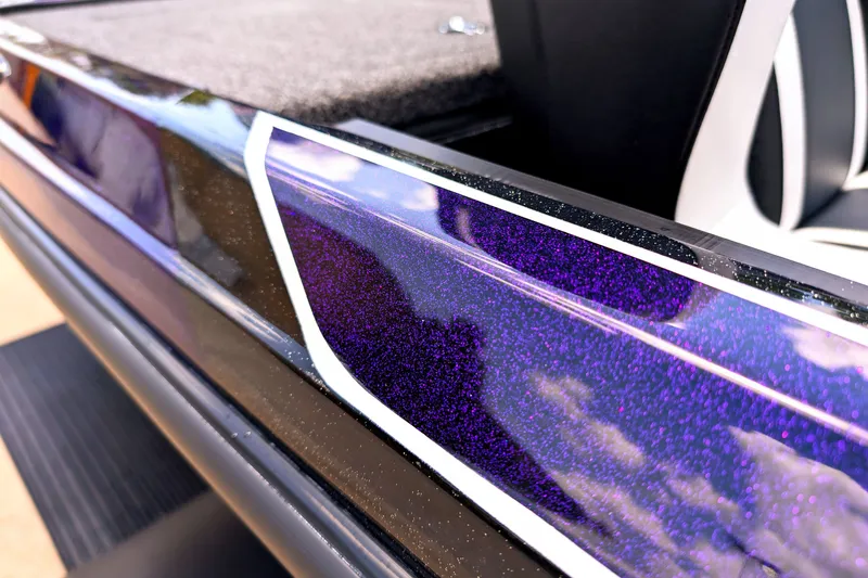 Slide: The Image of Close-up of 2027 Nitro Z18 XL Pro boat with purple metallic finish. - 4