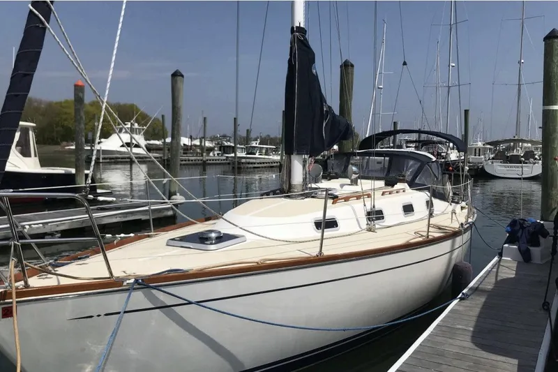The Image of Sailboat docked at marina, 1994 Tartan 3100 model, sunny day. - 1