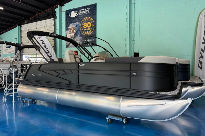 The Image of 2027 Sylvan Mirage Q20 ULZ pontoon boat displayed in a showroom. - 0