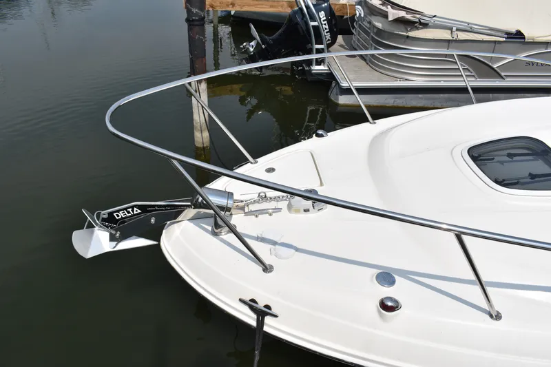 Slide: The Image of 2007 Sea Ray 270 Amberjack boat with Delta anchor, docked in marina. - 4