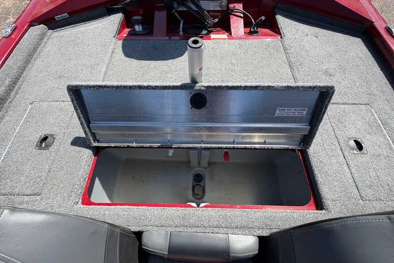 Slide: The Image of 2023 Bass Tracker Pro 17 boat interior with open storage compartment. - 27