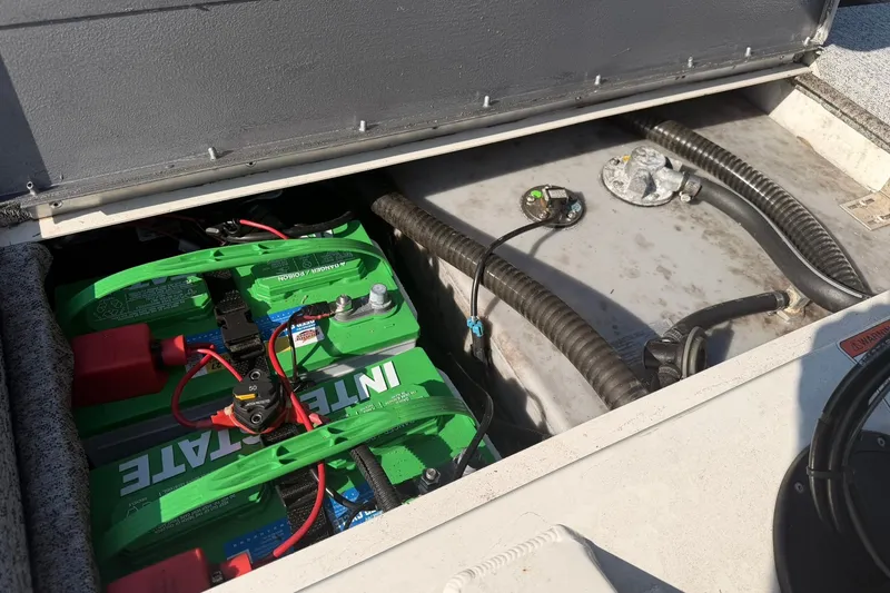 Slide: The Image of Battery compartment of 2023 Tracker Pro Team 190 TX Tournament Edition boat. - 47