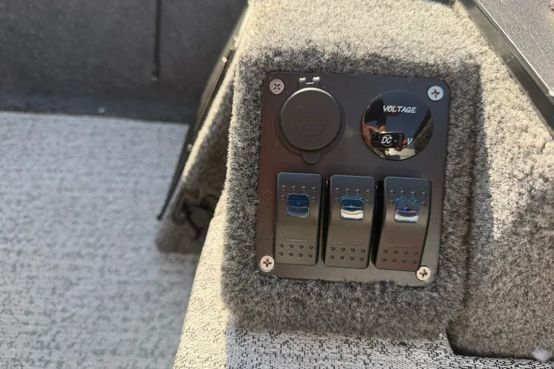 Slide: The Image of Control panel on 2023 Tracker Pro Team 190 TX Tournament Edition boat. - 56