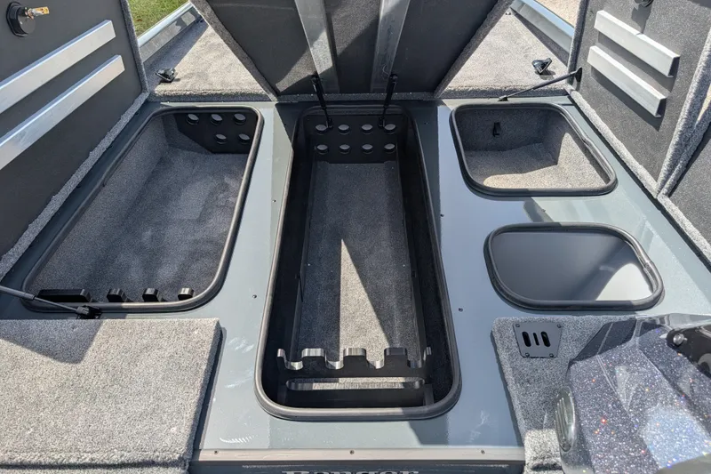 Slide: The Image of 2027 Ranger RT198P boat storage compartments with open lids, showcasing spacious interior design. - 6