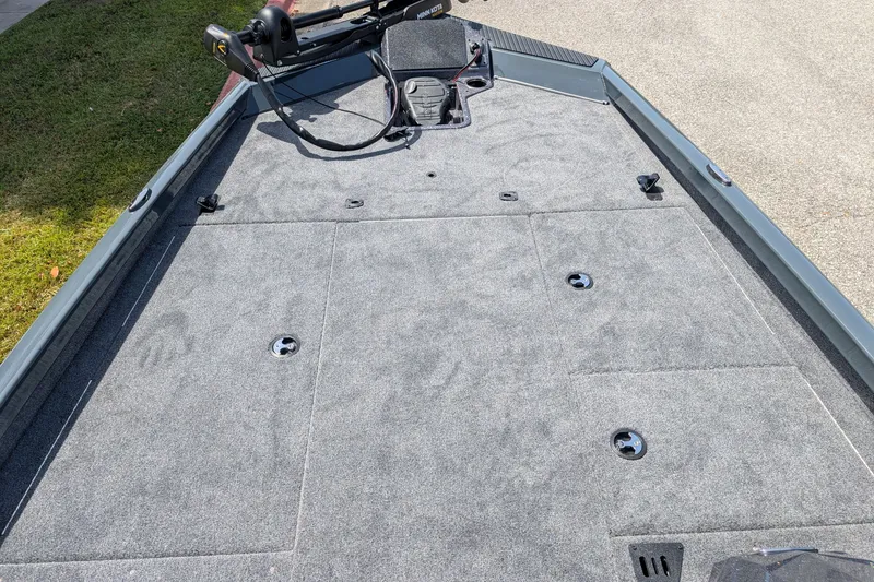 Slide: The Image of 2027 Ranger RT198P boat deck with gray carpet and trolling motor. - 4