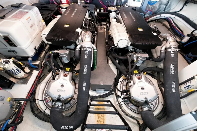 Slide: The Image of Engine room of 2025 Regal 42 Grande Coupe with Volvo Penta engines and marine equipment. - 43