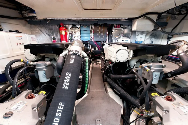 Slide: The Image of Engine room of 2025 Regal 42 Grande Coupe with Volvo Penta engines and equipment. - 44