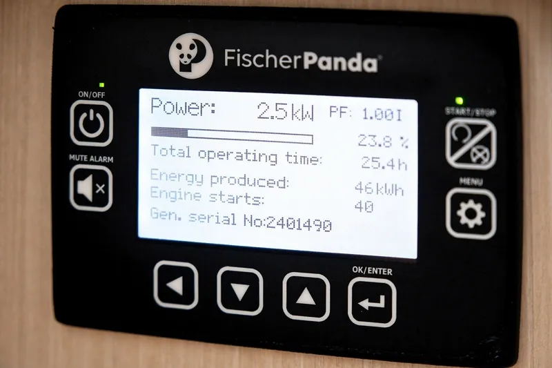 Slide: The Image of Fischer Panda generator display on 2025 Regal 42 Grande Coupe, showing power and operational data. - 42