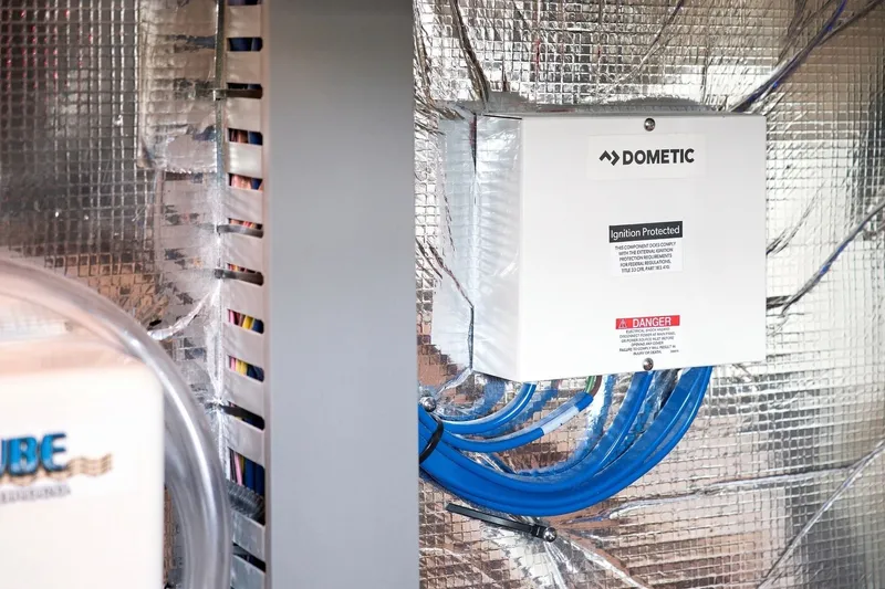 Slide: The Image of Electrical system with Dometic ignition protection in 2025 Regal 42 Grande Coupe yacht. - 32