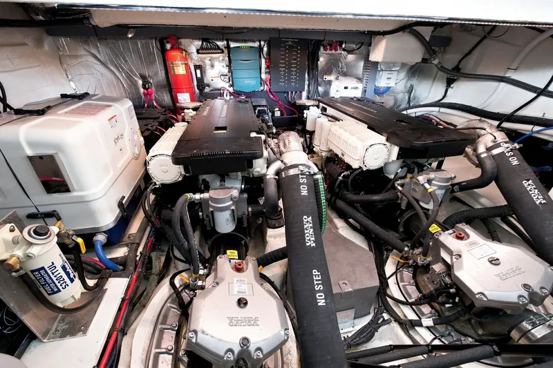 Slide: The Image of Engine room of 2025 Regal 42 Grande Coupe with Volvo Penta engines and equipment. - 45