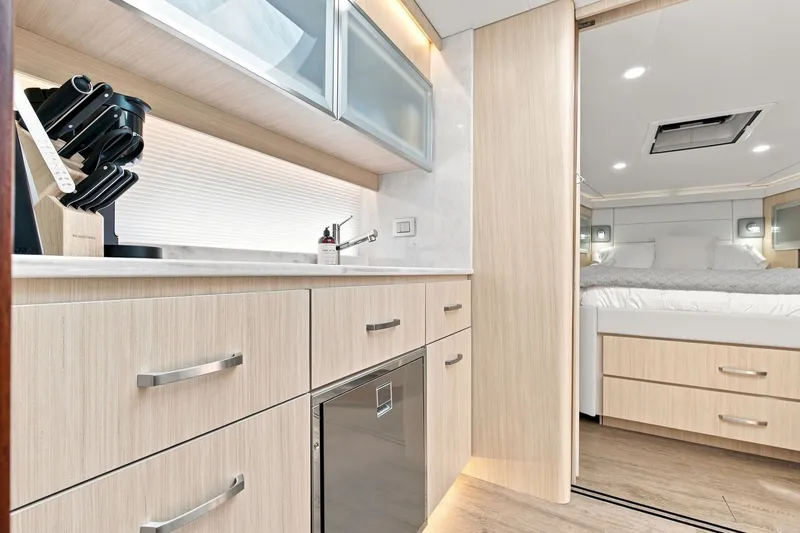 Slide: The Image of Modern kitchen and bedroom interior of 2025 Regal 42 Grande Coupe yacht. - 19