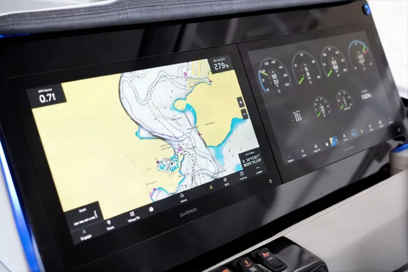 Slide: The Image of Dashboard of 2025 Regal 42 Grande Coupe with navigation and instrument displays. - 16