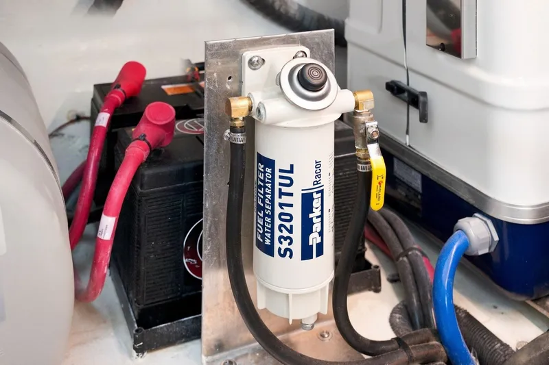 Slide: The Image of Fuel filter and water separator in 2025 Regal 42 Grande Coupe engine compartment. - 36