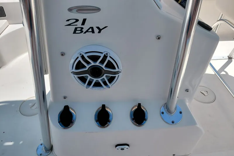 Slide: The Image of 2020 Cobia 21 Bay boat console with speaker and controls. - 24