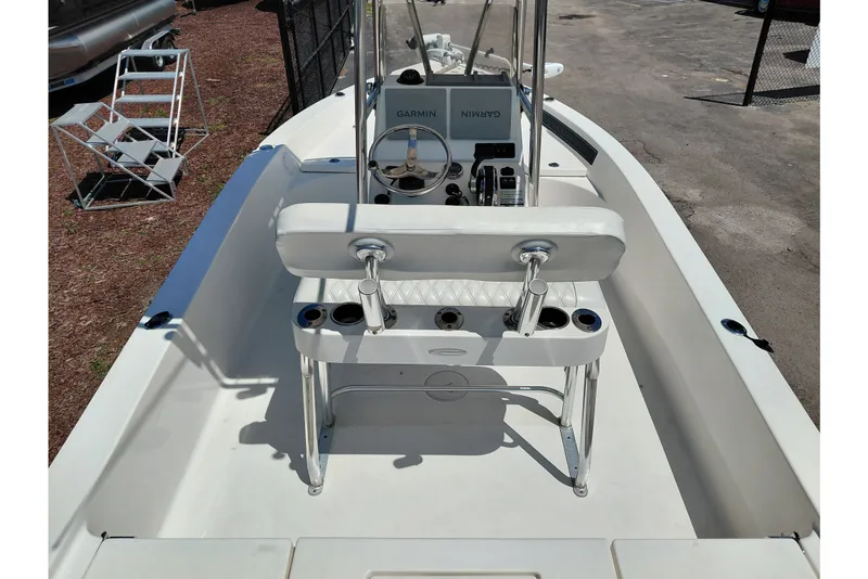 Slide: The Image of 2020 Cobia 21 Bay boat interior with steering console and seating. - 39