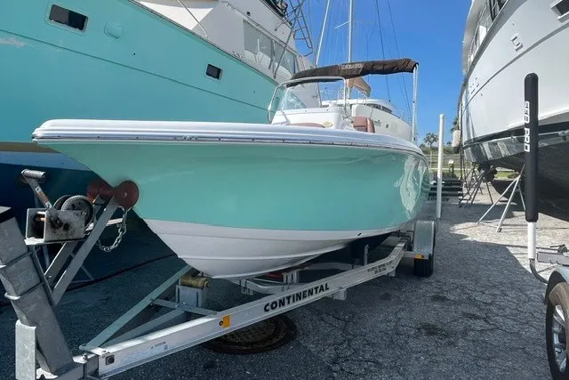 The Image of 2017 Tidewater 198 CC Adventure boat on trailer, parked outdoors. - 1
