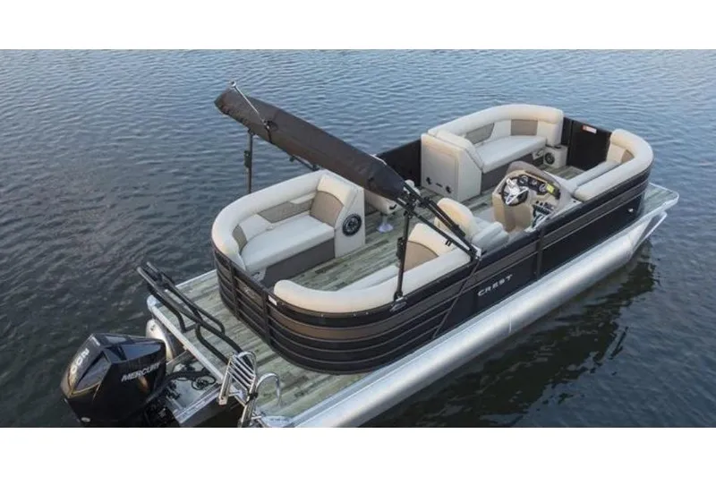 Slide: The Image of Manufacturer Provided Image: 2021 Crest Classic DLX 220 SLC pontoon boat on water, featuring spacious seating and a Mercury outboard motor. - 3