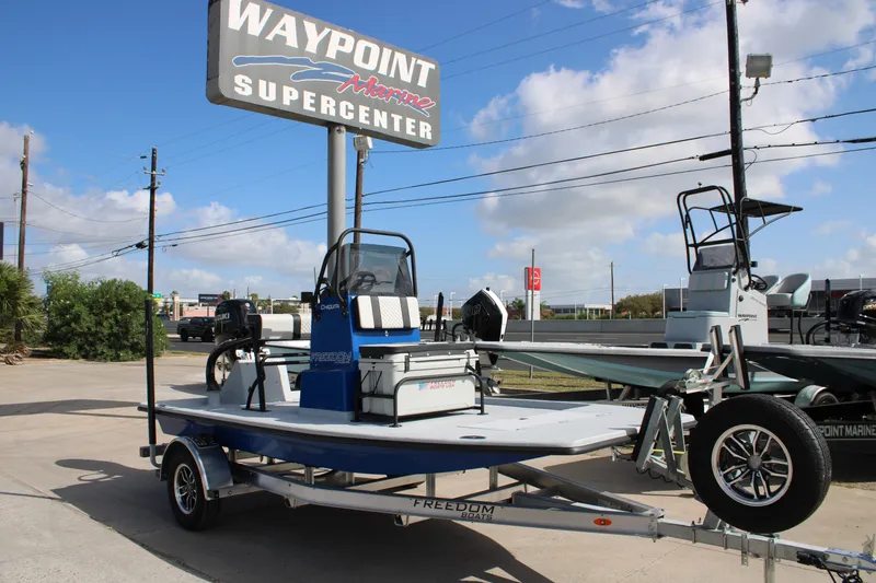 The Image of 2027 Freedom Boats Chiquita on trailer at Waypoint Marine Supercenter. - 1