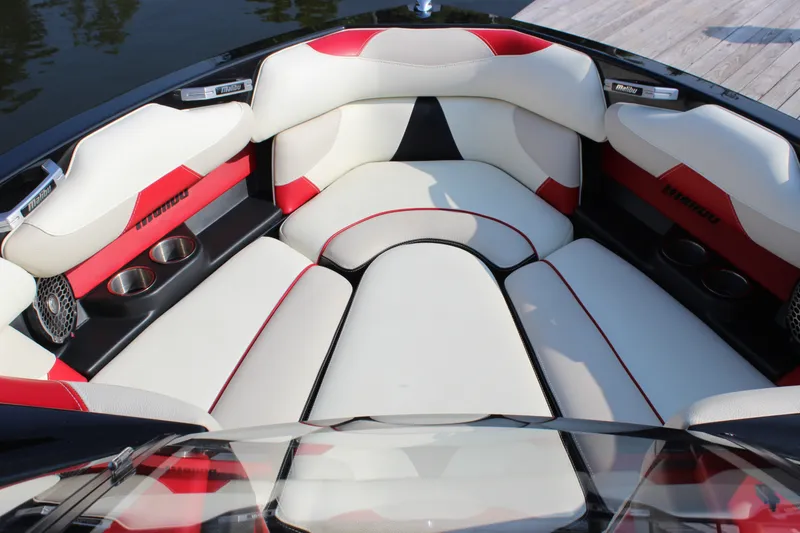 Slide: The Image of Luxurious interior of 2015 Malibu Wakesetter 22 VLX boat with red and white seating. - 7