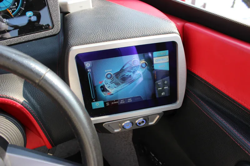 Slide: The Image of Touchscreen control panel in 2015 Malibu Wakesetter 22 VLX boat cockpit. - 23