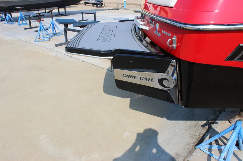 Slide: The Image of 2015 Malibu Wakesetter 22 VLX with Surf Gate technology on display. - 30