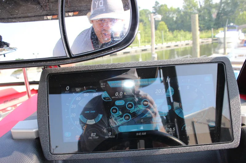 Slide: The Image of Dashboard of a 2015 Malibu Wakesetter 22 VLX boat with digital display. - 27