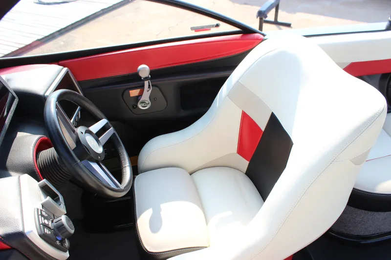 Slide: The Image of Interior of 2015 Malibu Wakesetter 22 VLX boat with stylish steering and seating. - 20