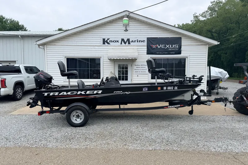 The Image of 2023 Bass Tracker Pro 17 boat displayed outside Knox Marine dealership. - 1