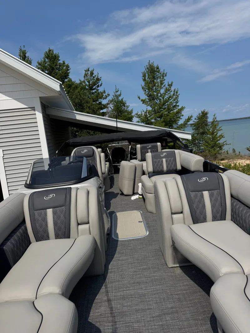 Slide: The Image of The image shows the interior of a 2024 Barletta Lusso 23M with luxurious seating. - 10