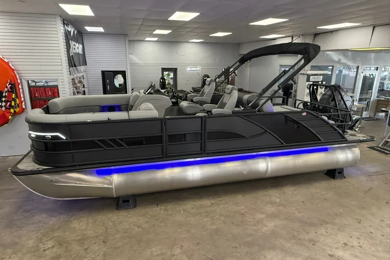 Slide: The Image of 2026 Bentley Pontoons Elite 223 Swingback with sleek design and modern features in showroom. - 3