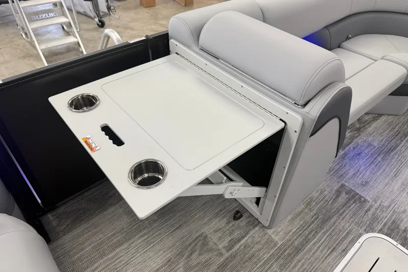 Slide: The Image of 2026 Bentley Pontoons Elite 223 Swingback with foldable table and cup holders. - 19