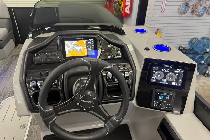 Slide: The Image of 2026 Bentley Pontoons Elite 223 Swingback dashboard with advanced navigation and control systems. - 6