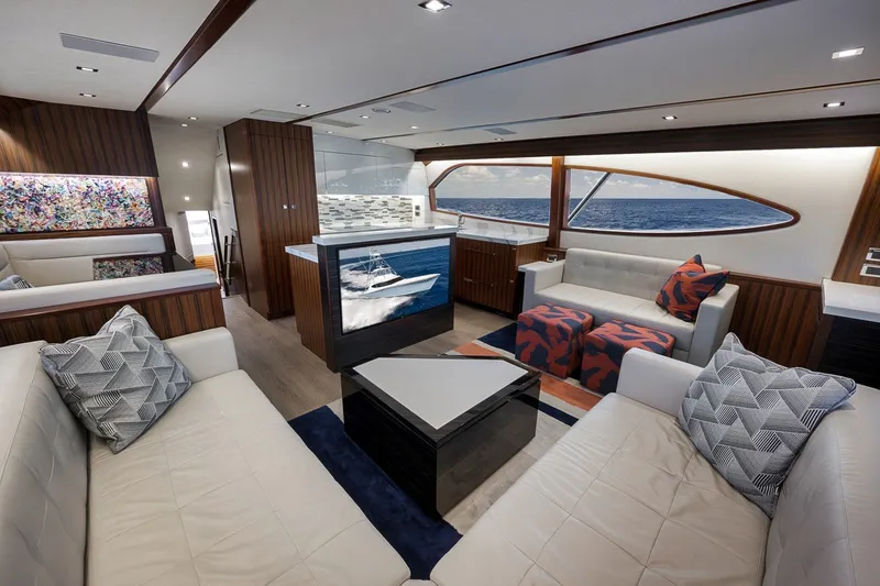 Slide: The Image of Luxurious interior of 2021 Hatteras GT65 Carolina yacht with modern furnishings and ocean view. - 30