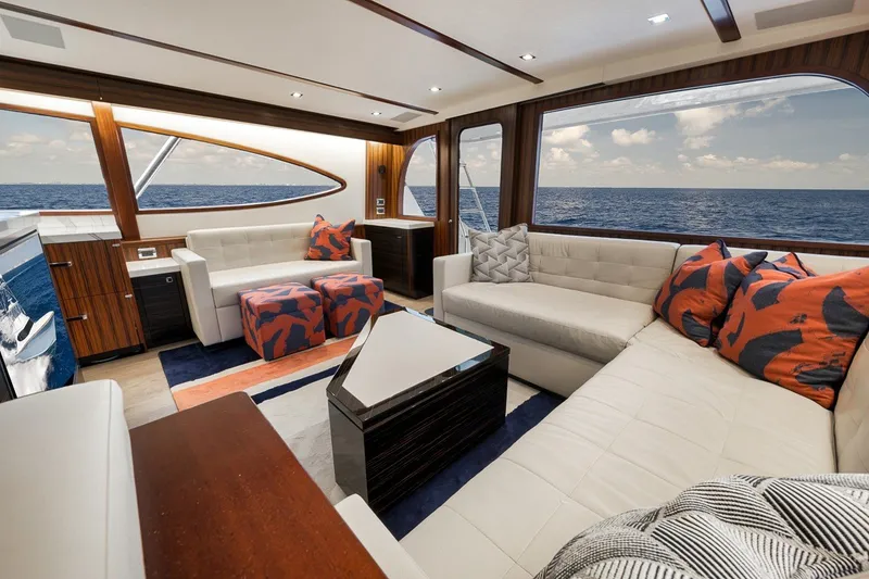 Slide: The Image of Luxurious interior of 2021 Hatteras GT65 Carolina yacht with ocean view. - 31
