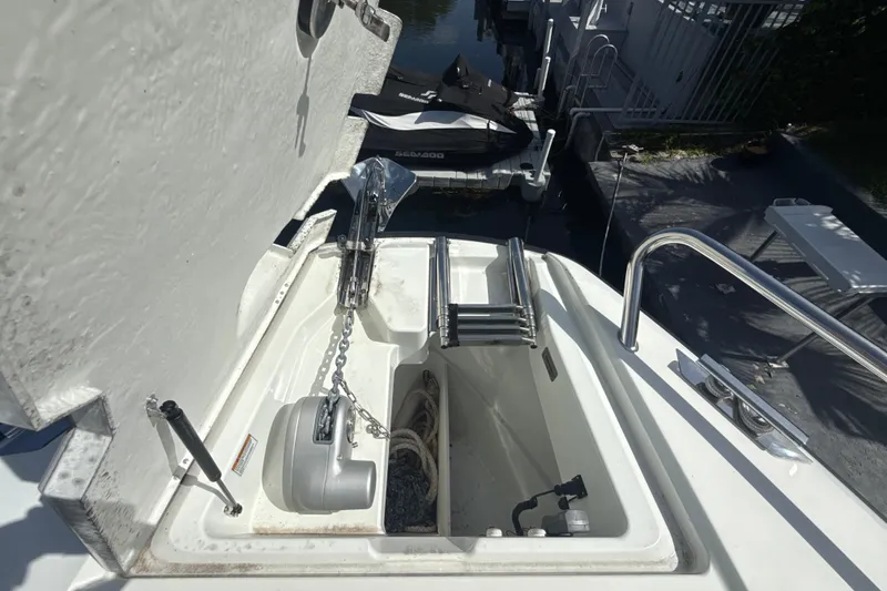 Slide: The Image of 2024 Quarken 35 Cabin Tourer anchor compartment with chain and rope storage. - 28